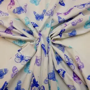 Curtain Canvas Fabric Poppin Butterflies Ivory Blue