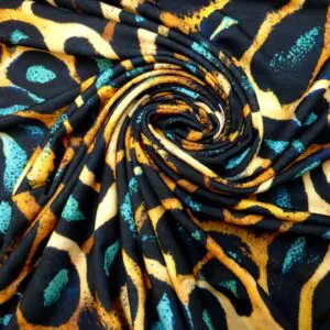 T-Shirting Fabric Animal Print Flintstones Jade Sand Yellow
