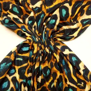 T-Shirting Fabric Animal Print Flintstones Jade Sand Yellow