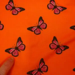 T-Shirting Jersey Fabric Butterfly Betsy Orange Cerise