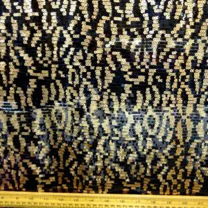 Sequin Fabric On Net Cable Copper Black