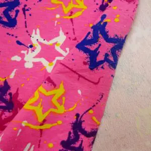 Jersey Fabric Printed Loop Backed Graffiti Stars Cerise Royal Yellow