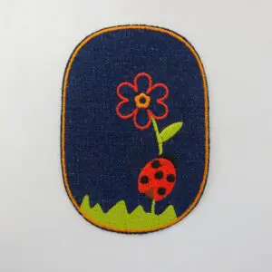 Sew On Motif Patch Ladybird On Dark Denim