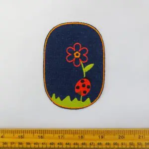 Sew On Motif Patch Ladybird On Dark Denim