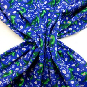 Brushed Cotton Fabric Extinct Jurassic Dinosaurs Royal/Emerald
