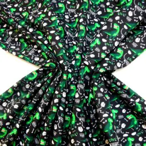 Brushed Cotton Fabric Extinct Jurassic Dinosaurs Black/Emerald