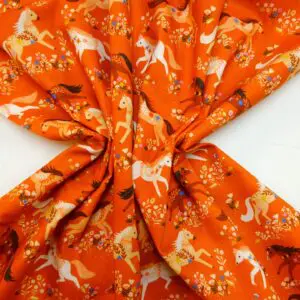 Cotton Fabric Dashwood Craft Cotton Merry Go Round Horses Terracotta Rust