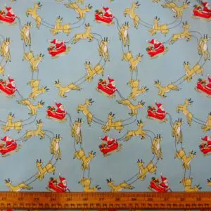 Christmas Fabric Polyester Cotton Dashing Reindeers Sky Blue