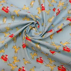 Christmas Fabric Polyester Cotton Dashing Reindeers Sky Blue