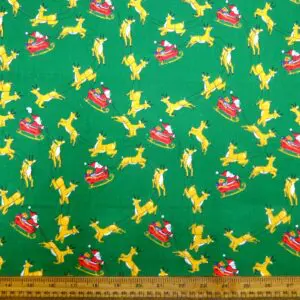 Christmas Fabric Polyester Cotton Dashing Reindeers Green
