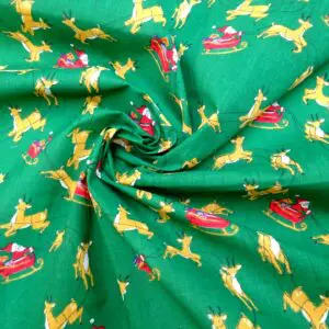 Christmas Fabric Polyester Cotton Dashing Reindeers Green