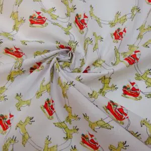 Christmas Fabric Polyester Cotton Dashing Reindeers White