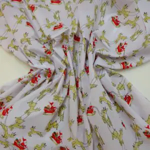 Christmas Fabric Polyester Cotton Dashing Reindeers White