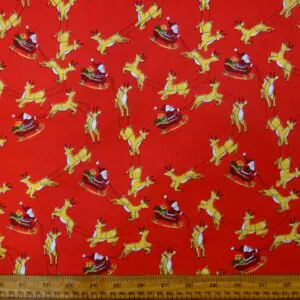 Christmas Fabric Polyester Cotton Dashing Reindeers Red