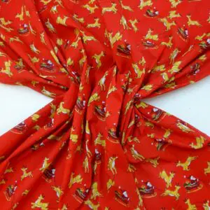 Christmas Fabric Polyester Cotton Dashing Reindeers Red