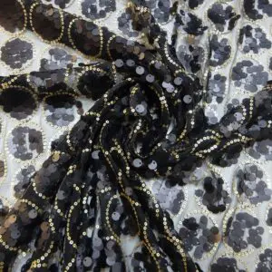 Sequin Fabric On Black Netting Whirl Black Gold