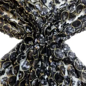 Sequin Fabric On Black Netting Whirl Black Gold