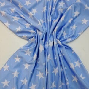 Lycra Patterned Fabric Star Struck pale blue