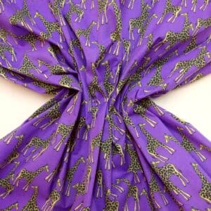 Polyester Cotton Fabric Funky Giraffe purple