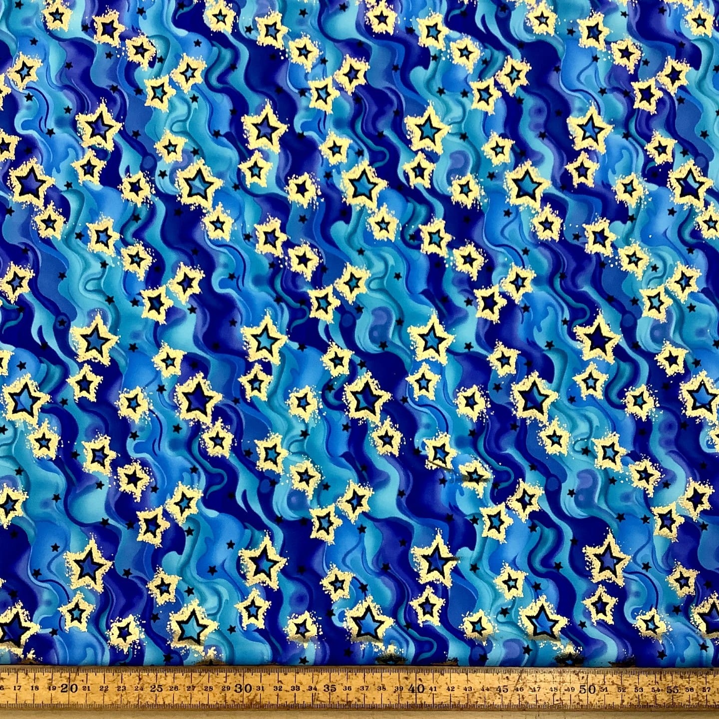 Lycra Fabric Blue Water Stars Foil Print
