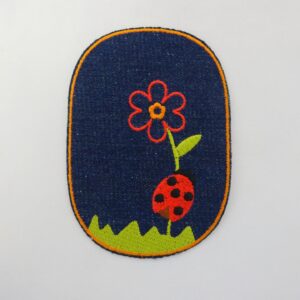 Sew On Motif Patch Ladybird On Dark Denim