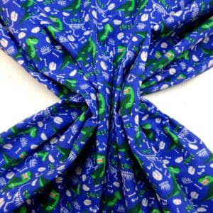Brushed Cotton Fabric Extinct Jurassic Dinosaurs Royal/Emerald