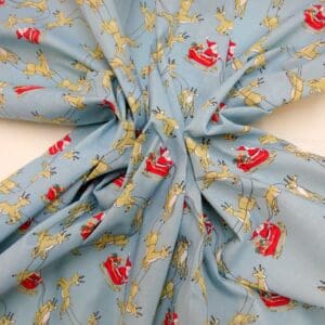 Christmas Fabric Polyester Cotton Dashing Reindeers Sky Blue