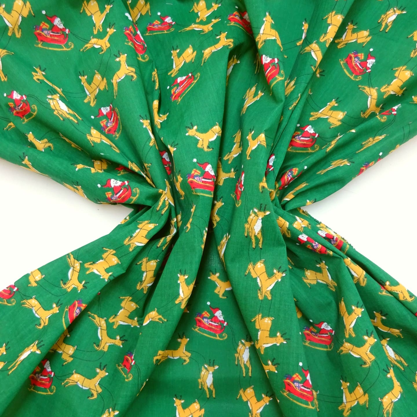 Christmas Fabric Polyester Cotton Dashing Reindeers Green