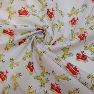 Christmas Fabric Polyester Cotton Dashing Reindeers White