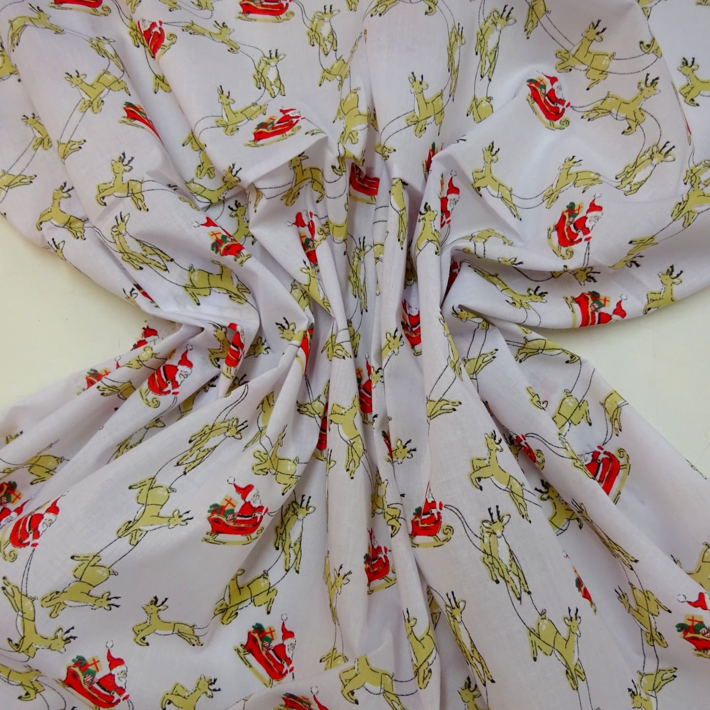 Christmas Fabric Polyester Cotton Dashing Reindeers White