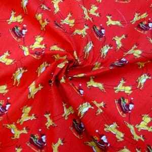 Christmas Fabric Polyester Cotton Dashing Reindeers Red